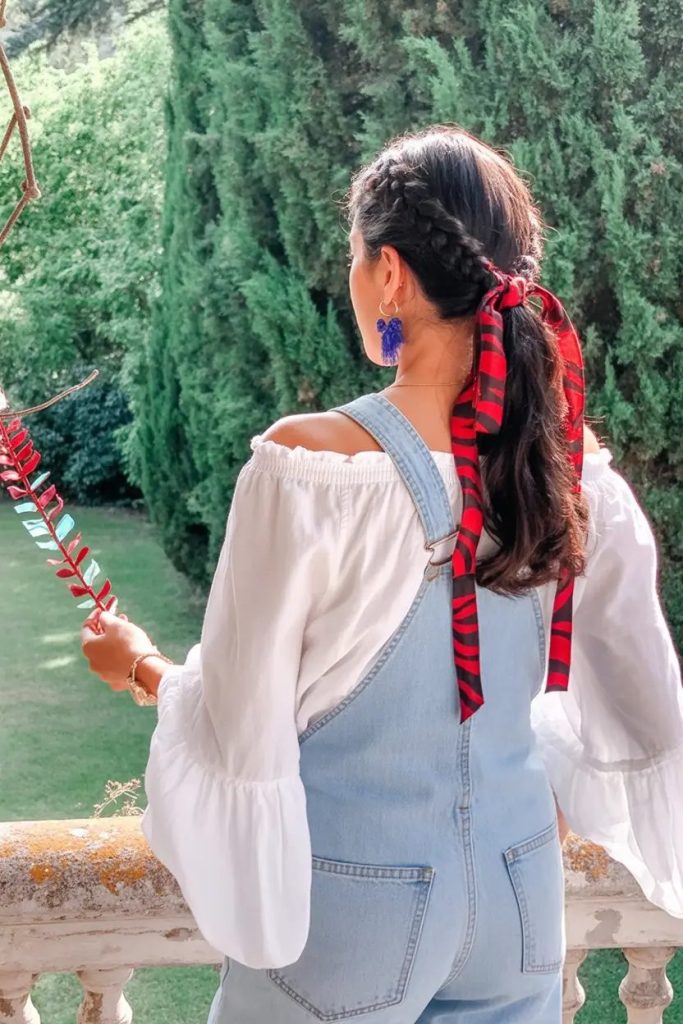 Braided Ponytail with Statement Ribbon for Festive Flair
