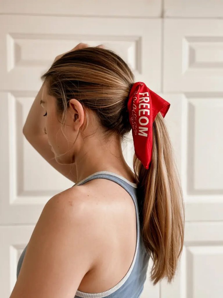 Low Ponytail with Red Statement Ribbon