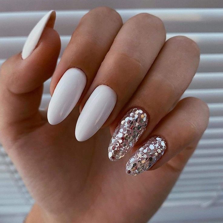 Glamorous Gala White Stiletto Nails with Glitter Accent