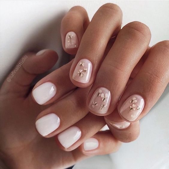 Minimalist Chic Nude Nails with Subdued Sparkle