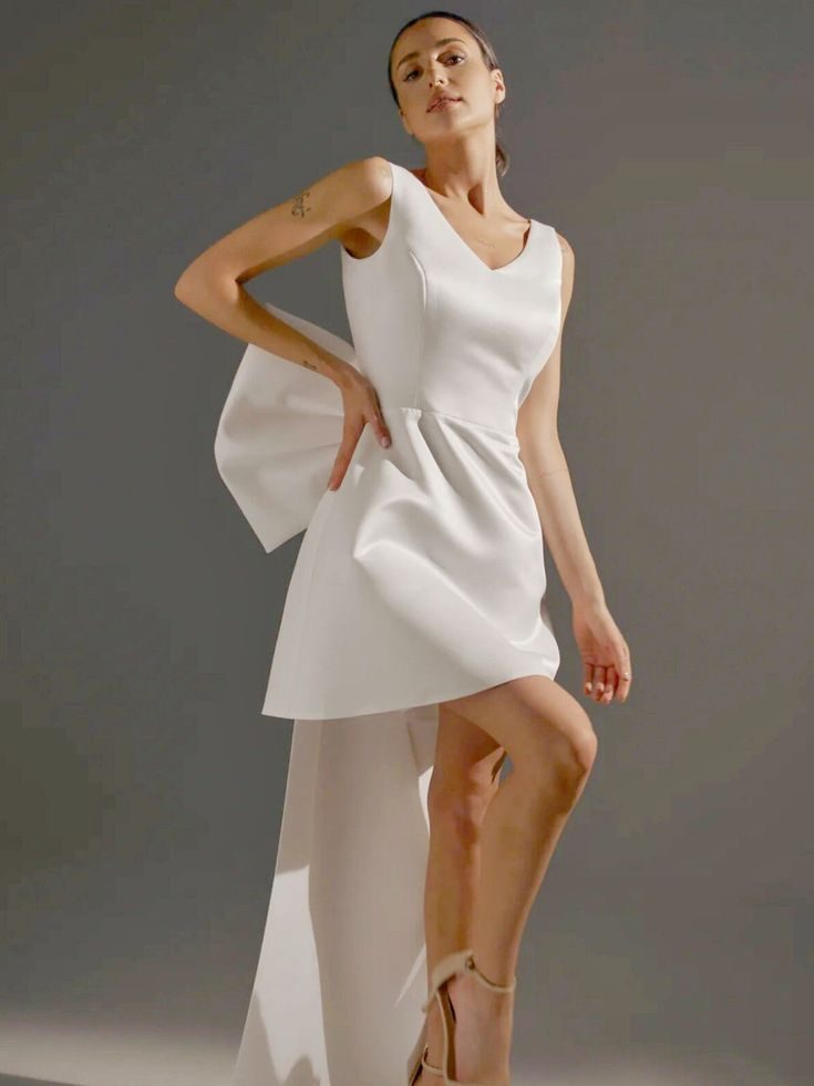 Minimalist Modern Dress with Bold Bow Detail