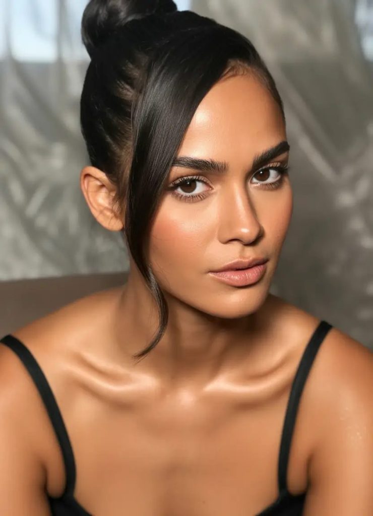 Polished Top Bun With a Bold, Flirty Front