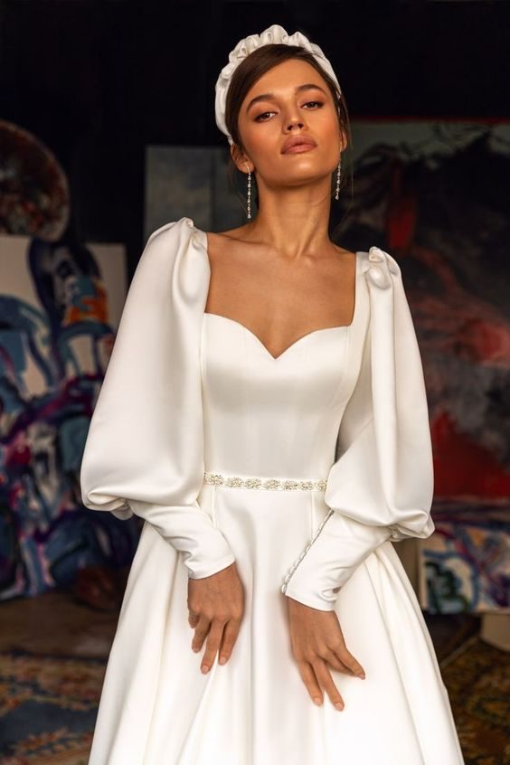 Regal Long-Sleeved Gown with Bejeweled Belt