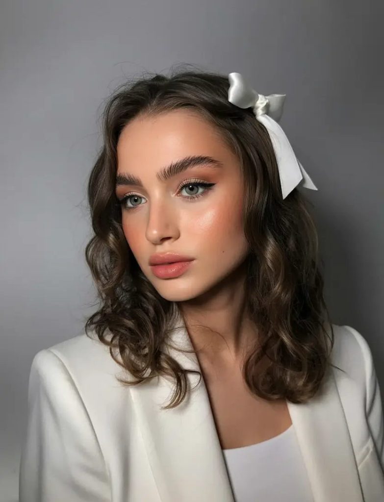 Ribboned Curls and Romantic Volume
