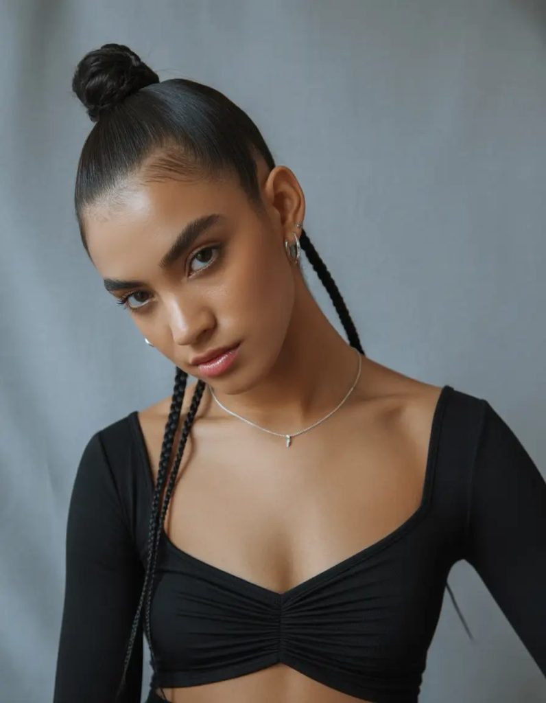 Sculpted High Braided Bun with Streamlined Ends