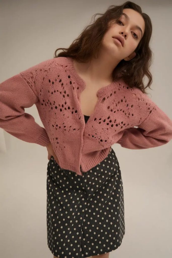 Soft Pink Cardigan with a Polka Dot Skirt