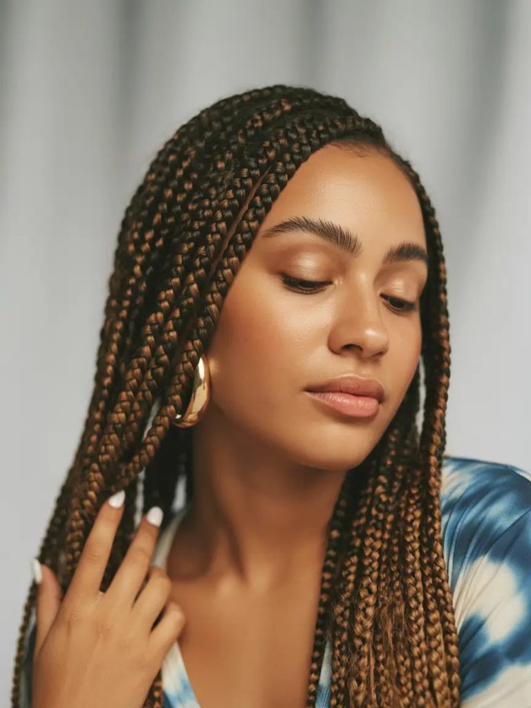 Warm Caramel Box Braids with Golden Undercurrents
