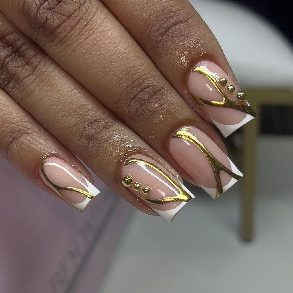 Abstract French with a Metallic Twist
