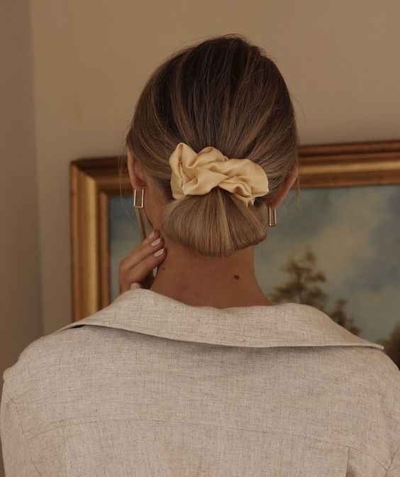 Elegant Bun with a Statement Bow