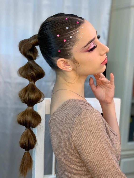 Sculpted Ponytail with a Modern Artistic Flair