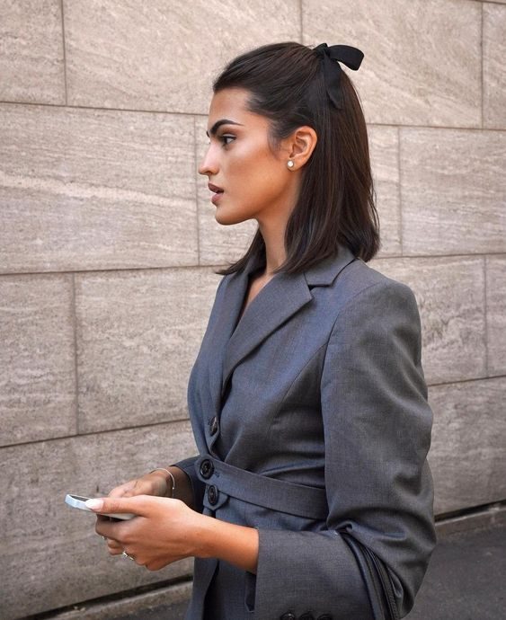 Sleek Ponytail with a Chic Ribbon