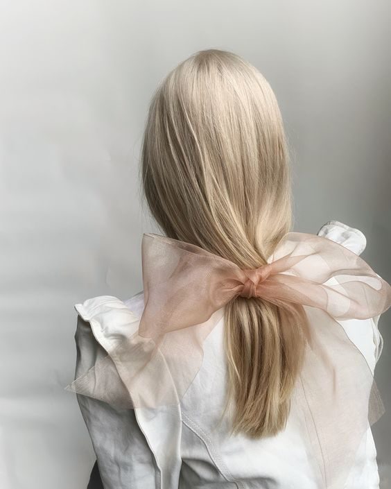 The Soft Blush Bow Ponytail