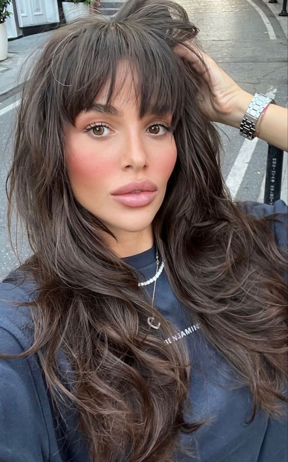 Voluminous Curly Shag with Bangs