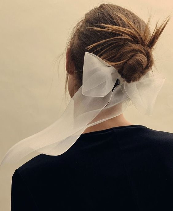 Whimsical White Bow Bun